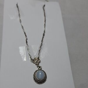 Elegant Silver Necklace with Sky Blue Pendant